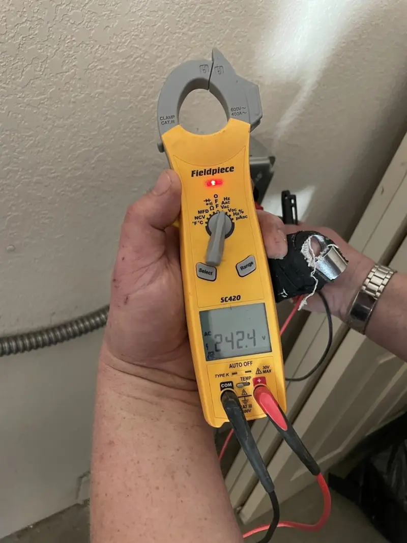 Voltage testing with clamp meter during Generator Installation in Phelan